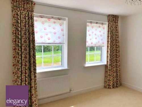 Double pinch curtains on truck and roller blinds